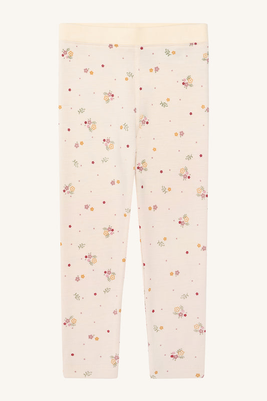 Hust&Claire Wollleggings in Naturweiss mit zartem Blumenmuster – erhältlich bei Bärechind in Winterthur, Zürich, Schweiz.