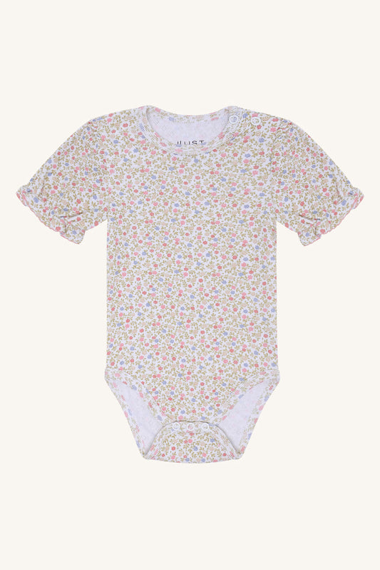 Hust&Claire Britt Blooming Body aus GOTS-zertifizierter Baumwolle mit Blumenmuster, erhältlich im Bärechind in Winterthur, Zürich, Schweiz.