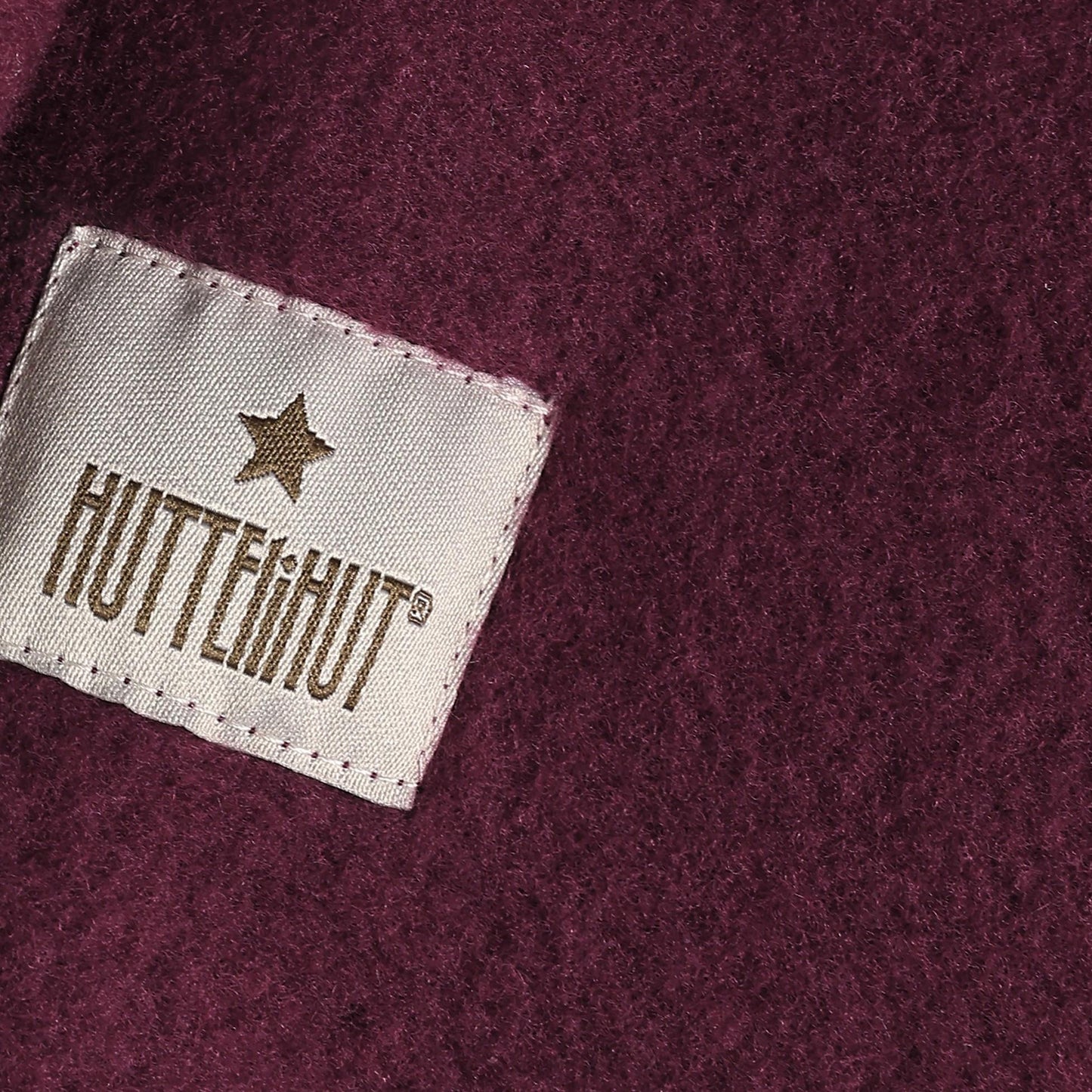 Merino Wollfleece Schlupfmütze von Huttelihut, Detailansicht aus dem Bärechind Sortiment