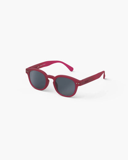 Kindersonnenbrille in Cranberry mit Federscharnier, Seitenansicht