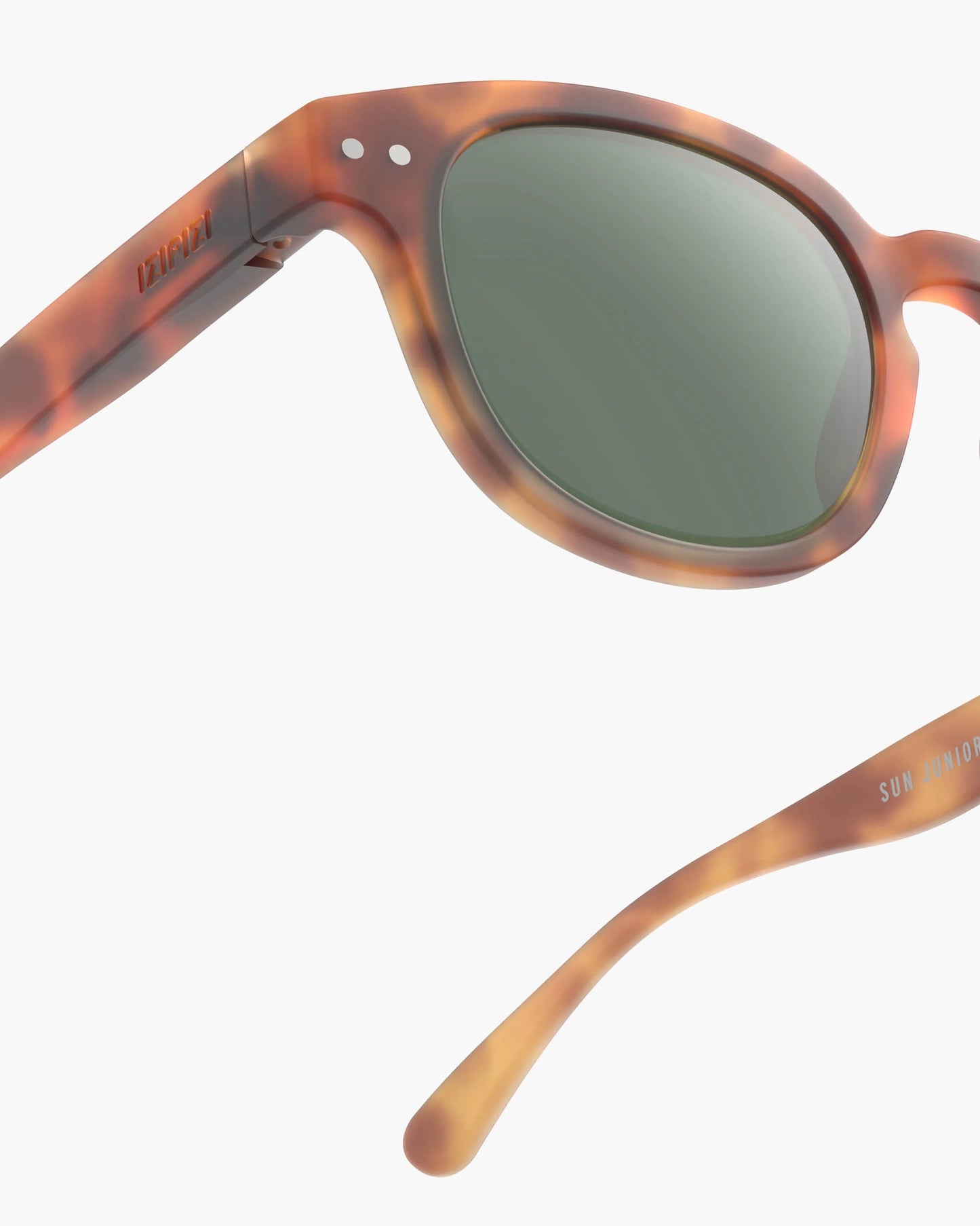 Kindersonnenbrille in Havane mit ergonomischem Gestell, Seitenansicht