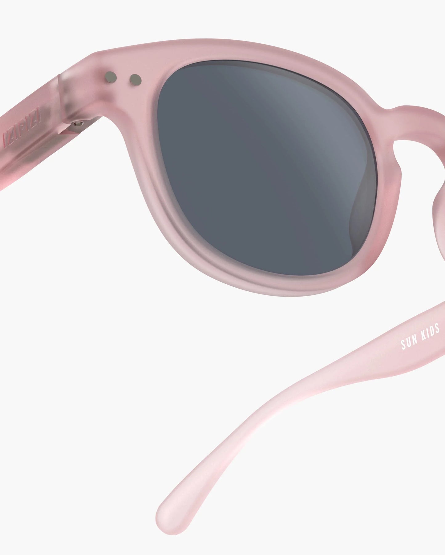 Kindersonnenbrille in Pink mit Federscharnier, Seitenansicht