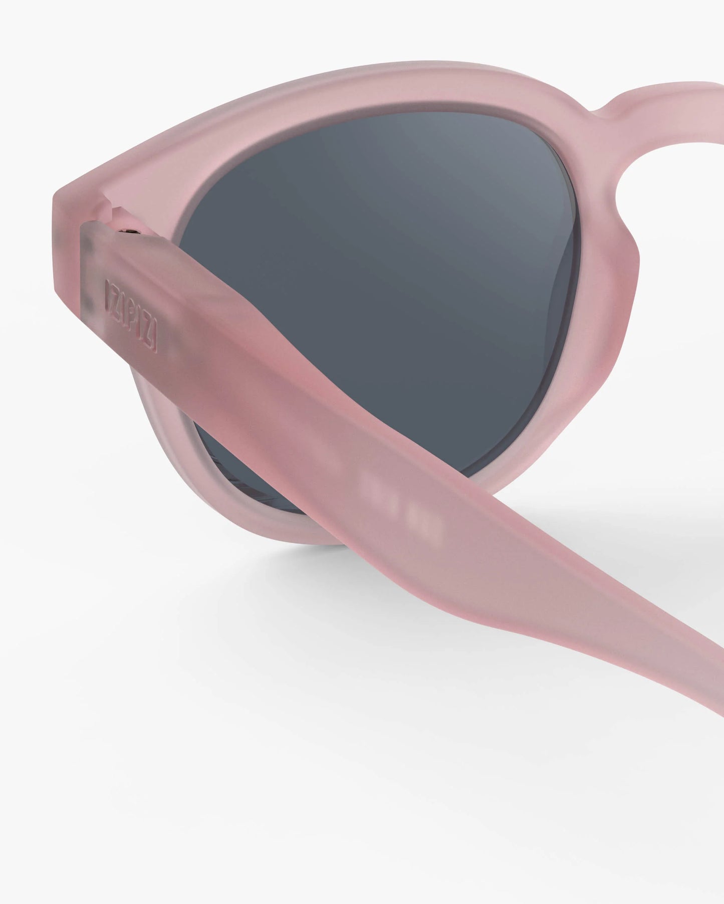 Kindersonnenbrille in Pink mit ergonomischem Gestell, Seitenansicht
