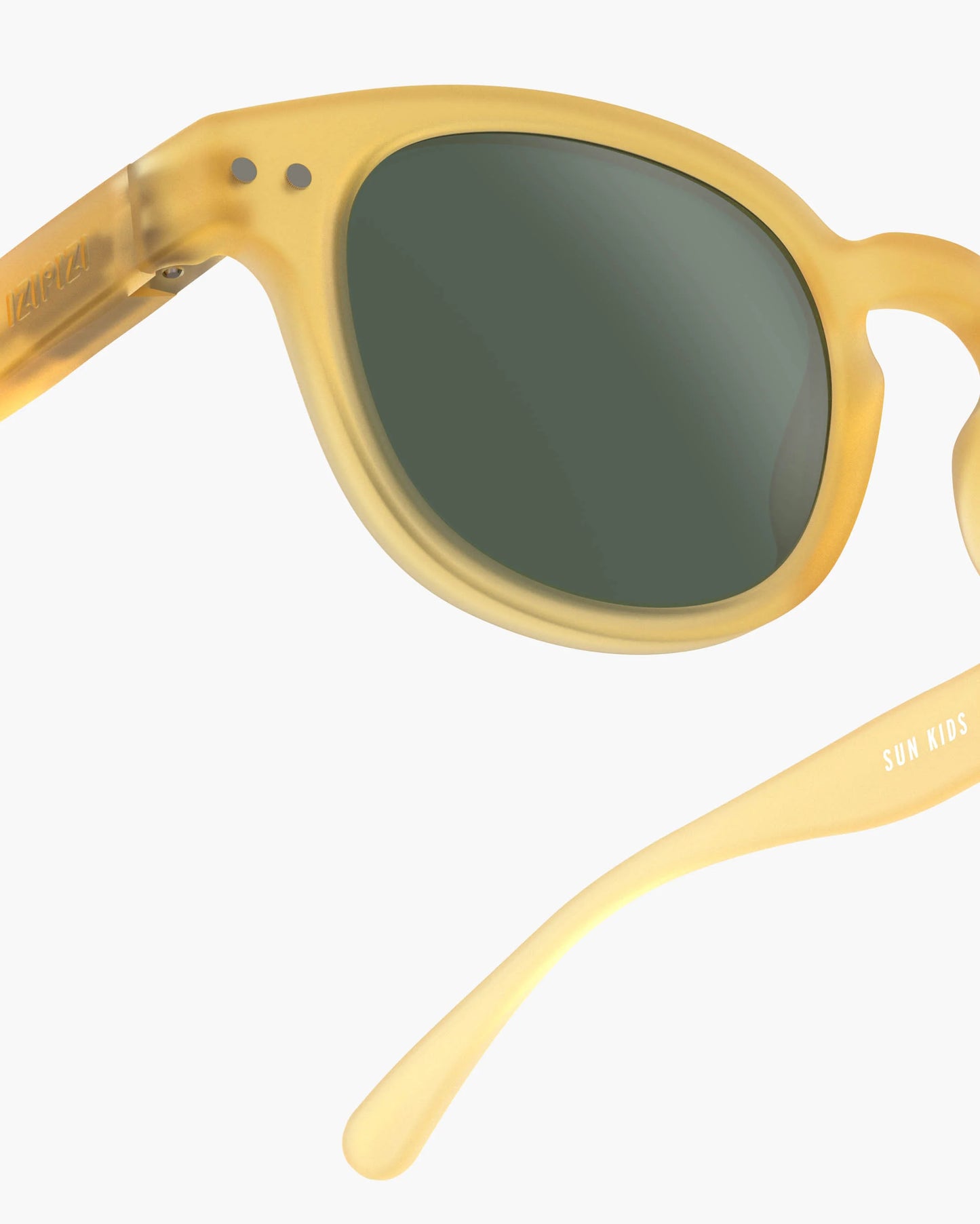 Kindersonnenbrille in Yellow Honey mit Federscharnier, Seitenansicht
