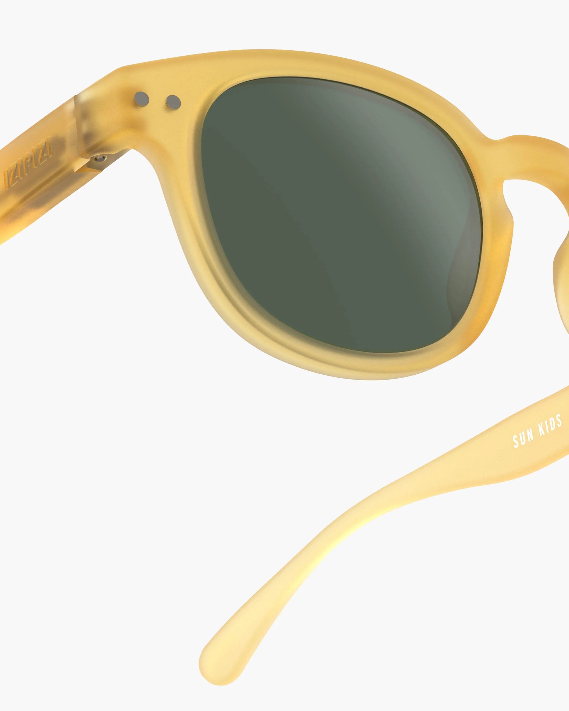 Kindersonnenbrille in Yellow Honey mit Federscharnier, Seitenansicht