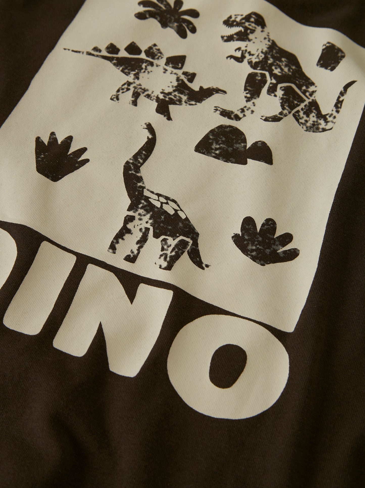 Detailansicht Dino-Print auf Kinder-Langarmshirt, Bärechind, Winterthur, Zürich Schweiz