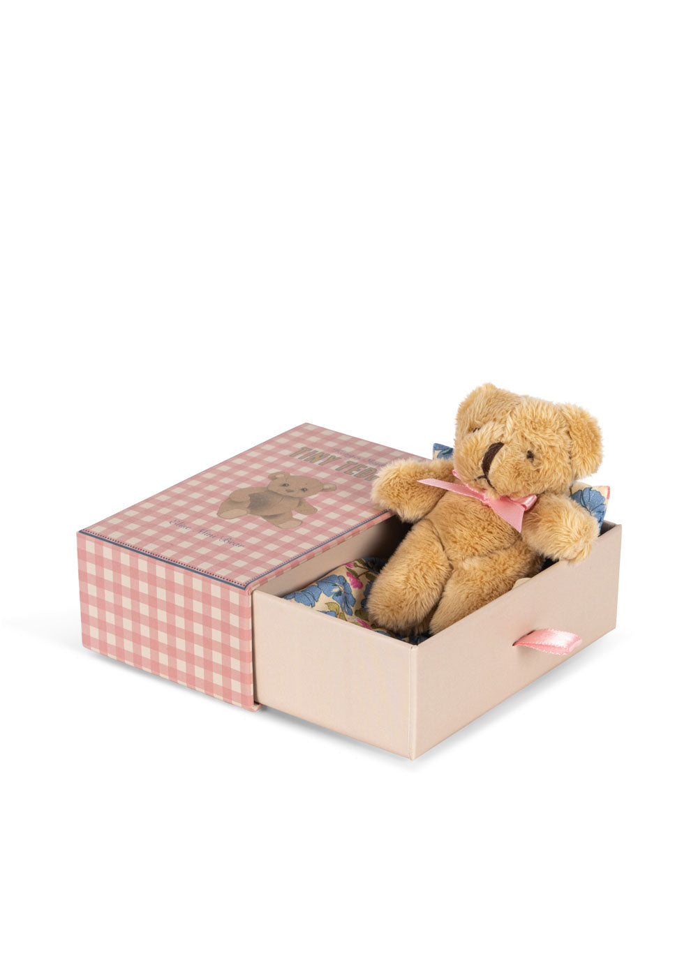 Mini-Teddy Elise liegt in der geöffneten Schublade des Bettchens