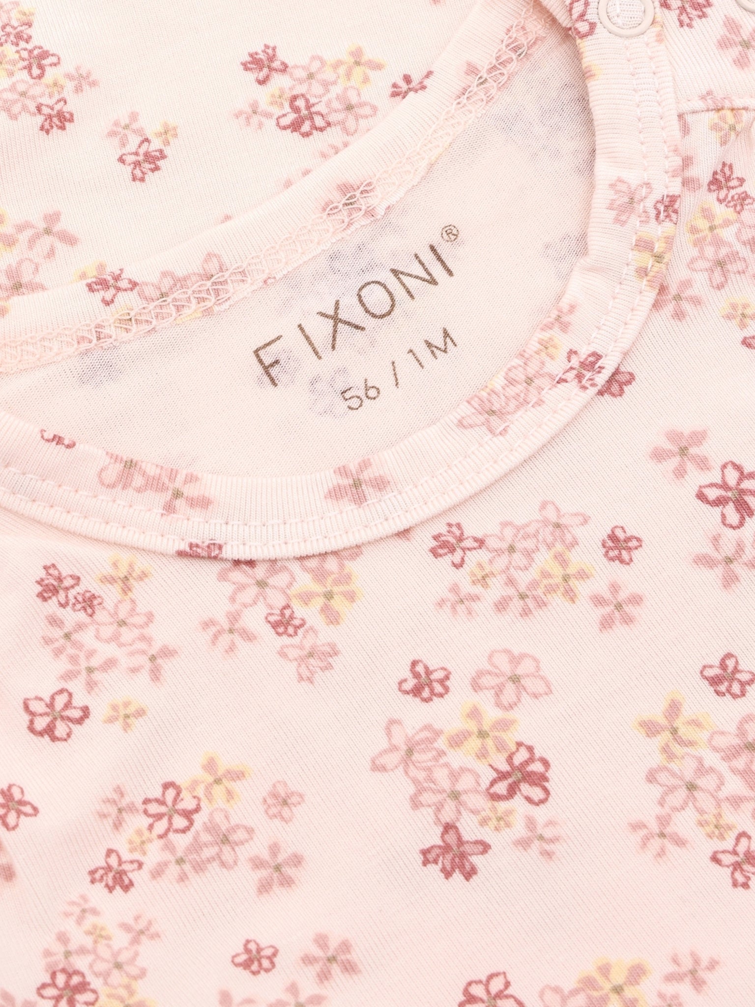 Detail Blumenprint rosa Baby Langarmbody FIXONI im Bärechind Winterthur Zürich Schweiz kaufen