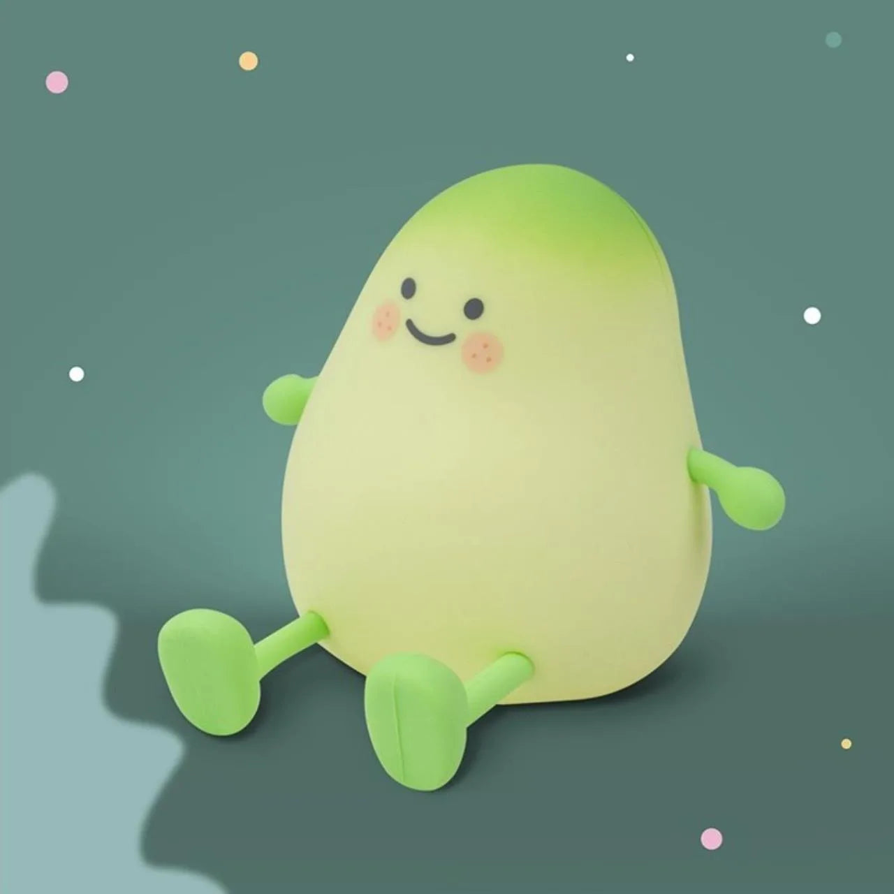 LED Nachtlicht in Form einer Mango aus Silikon, leuchtend im Kinderzimmer, erhältlich im Bärechind Winterthur Zürich Schweiz.