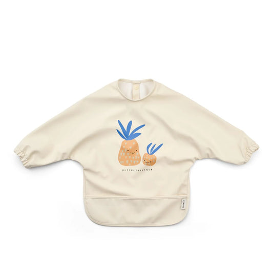 Liewood Merle Langarm-Lätzchen mit Ananas-Print für Babys – erhältlich im Bärechind Winterthur, Zürich, Schweiz.