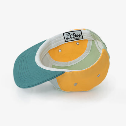 Detail Lil Boo Kinder Cap Block Yellow Green aus Bio Baumwolle mit breitem Sonnenschirm