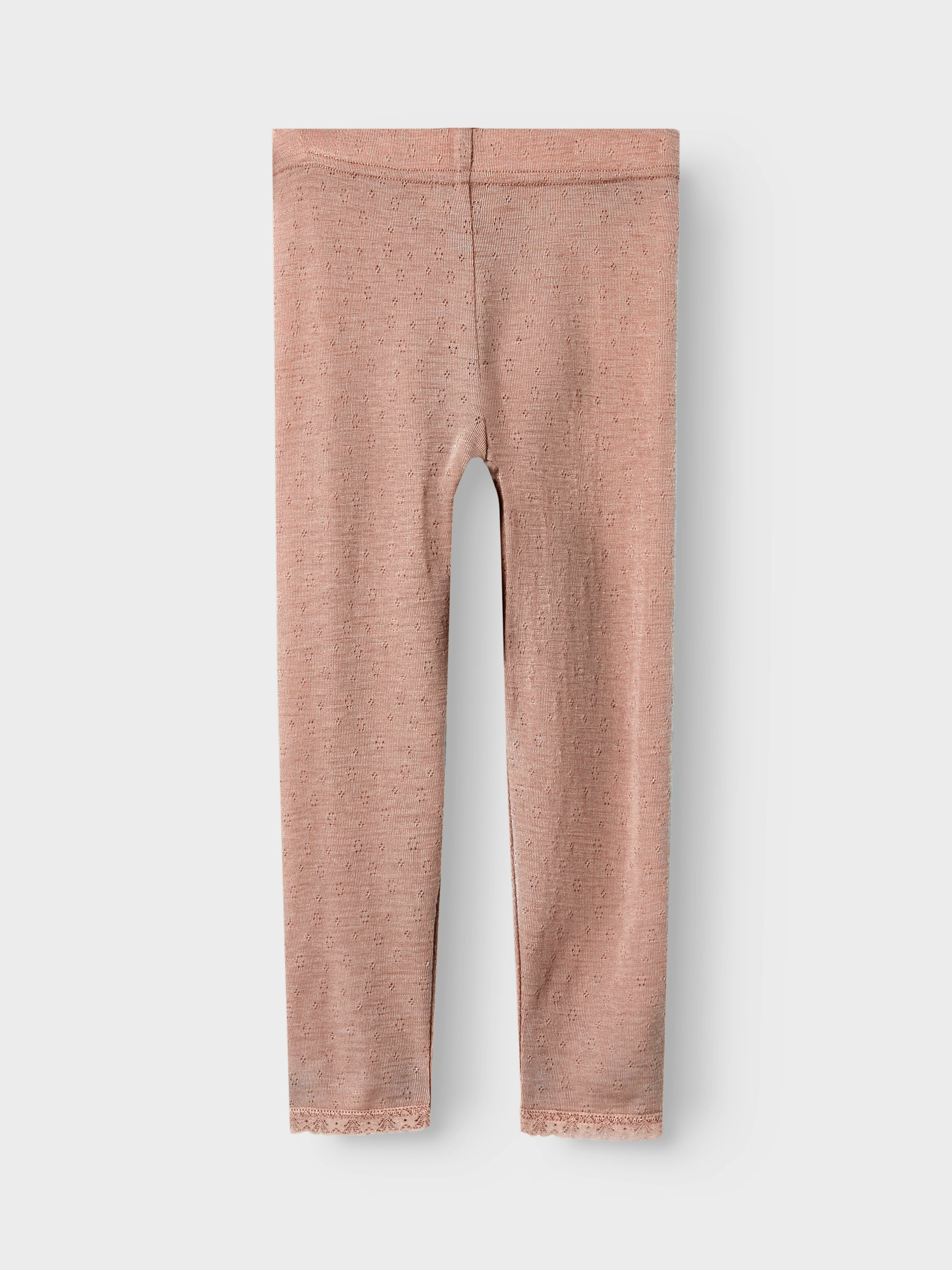 Vorderseite der Wollleggings mit Lochmuster in Rosa von Lil’Atelier – Bärechind Winterthur, Zürich, Schweiz.