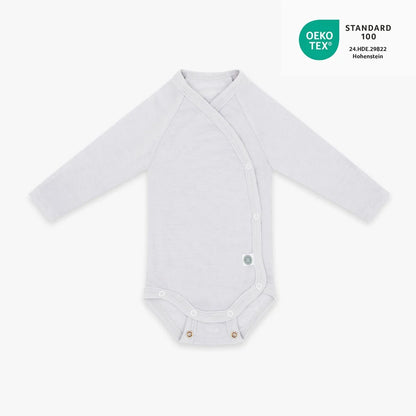 Grauer Merino Wickelbody von Emma & Noah aus 100 % Merinowolle, erhältlich im Bärechind in Winterthur, Zürich, Schweiz.