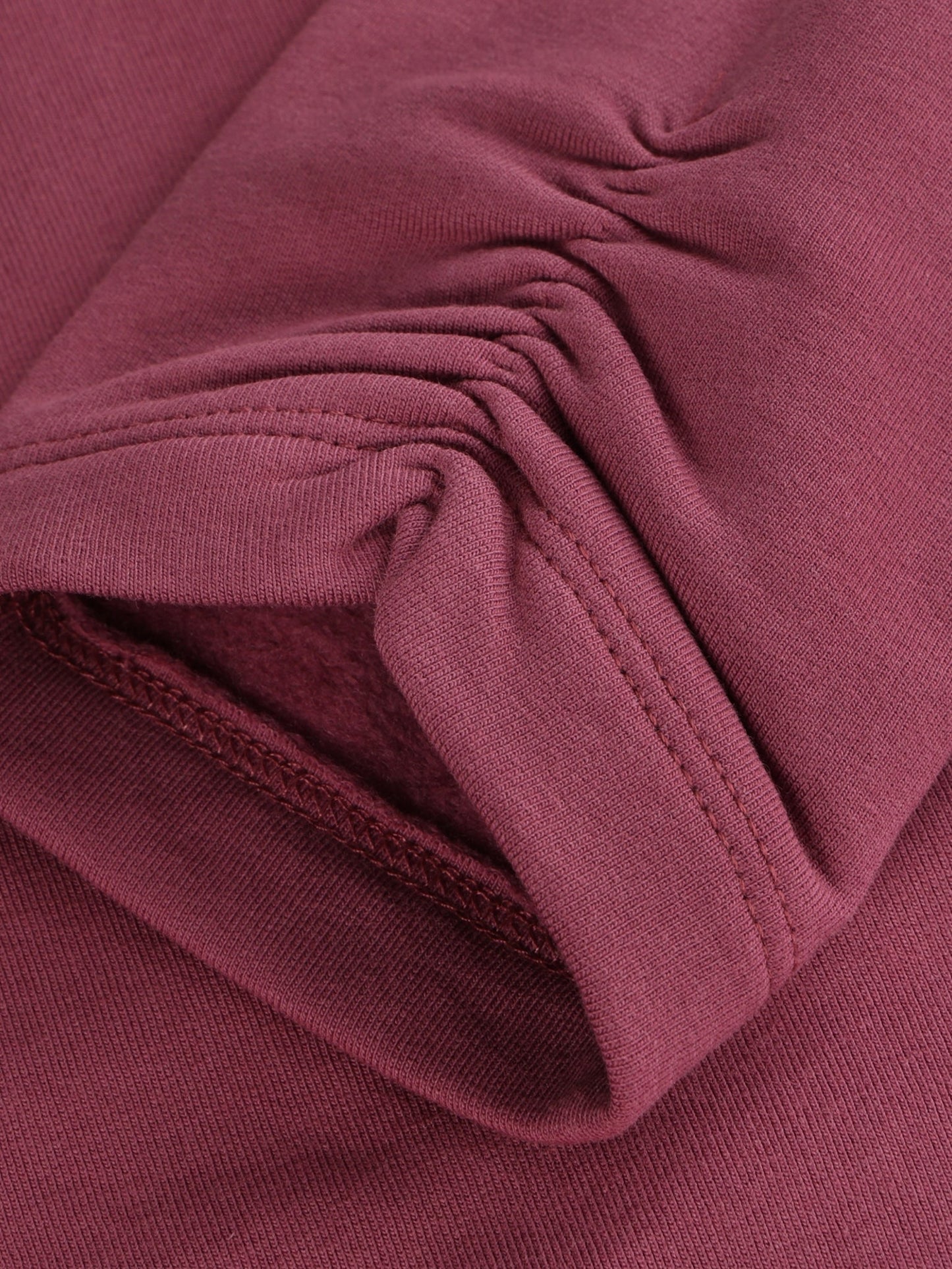 Minymo Bio Sweatleggings in Crushed Berry, Detailansicht Stoff