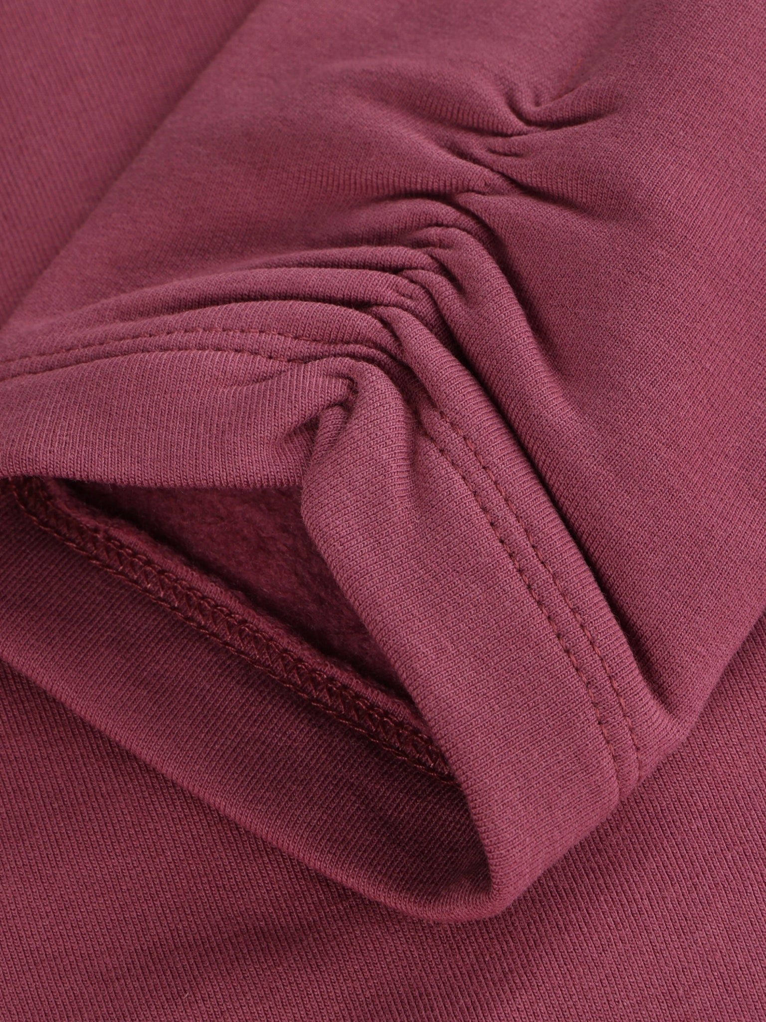 Minymo Bio Sweatleggings in Crushed Berry, Detailansicht Stoff