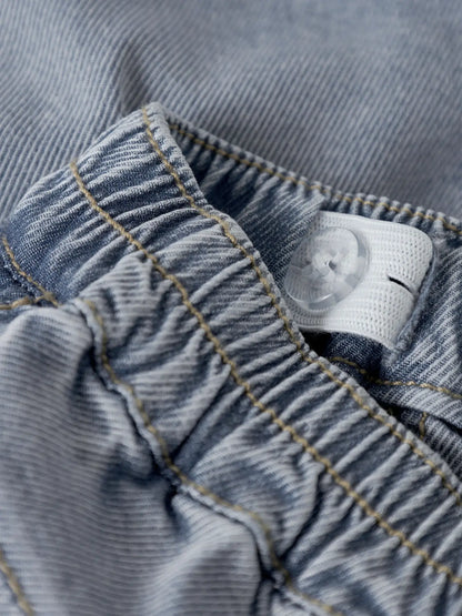 Detailansicht elastischer Bund der NAME IT Baby Jeans aus Denim, erhältlich bei Bärechind in Winterthur, Zürich, Schweiz.