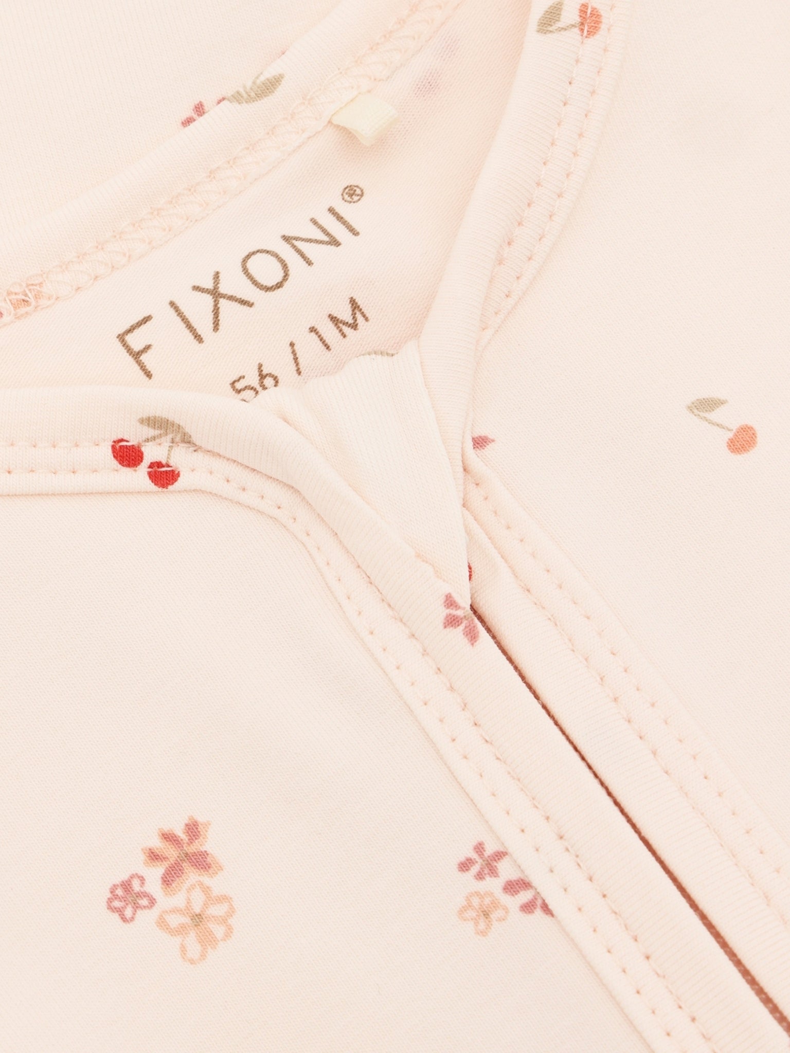 Detail Druckknöpfe und Kirschprint Baby Overall FIXONI im Bärechind Winterthur Zürich Schweiz kaufen