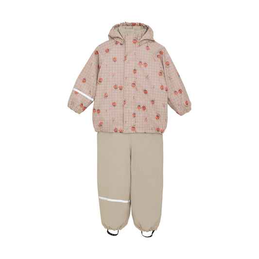 Kinder Regenoverall von CeLaVi beige mit roten Marienkäfern, Vorderseite, erhältlich im Bärechind Winterthur Zürich Schweiz.