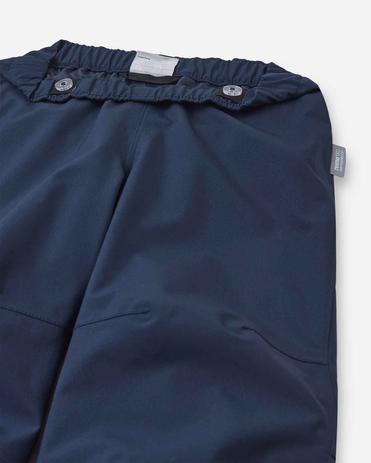 Bundverschluss der Reima Kaura Regenhose Navy mit Weitenregulierung
