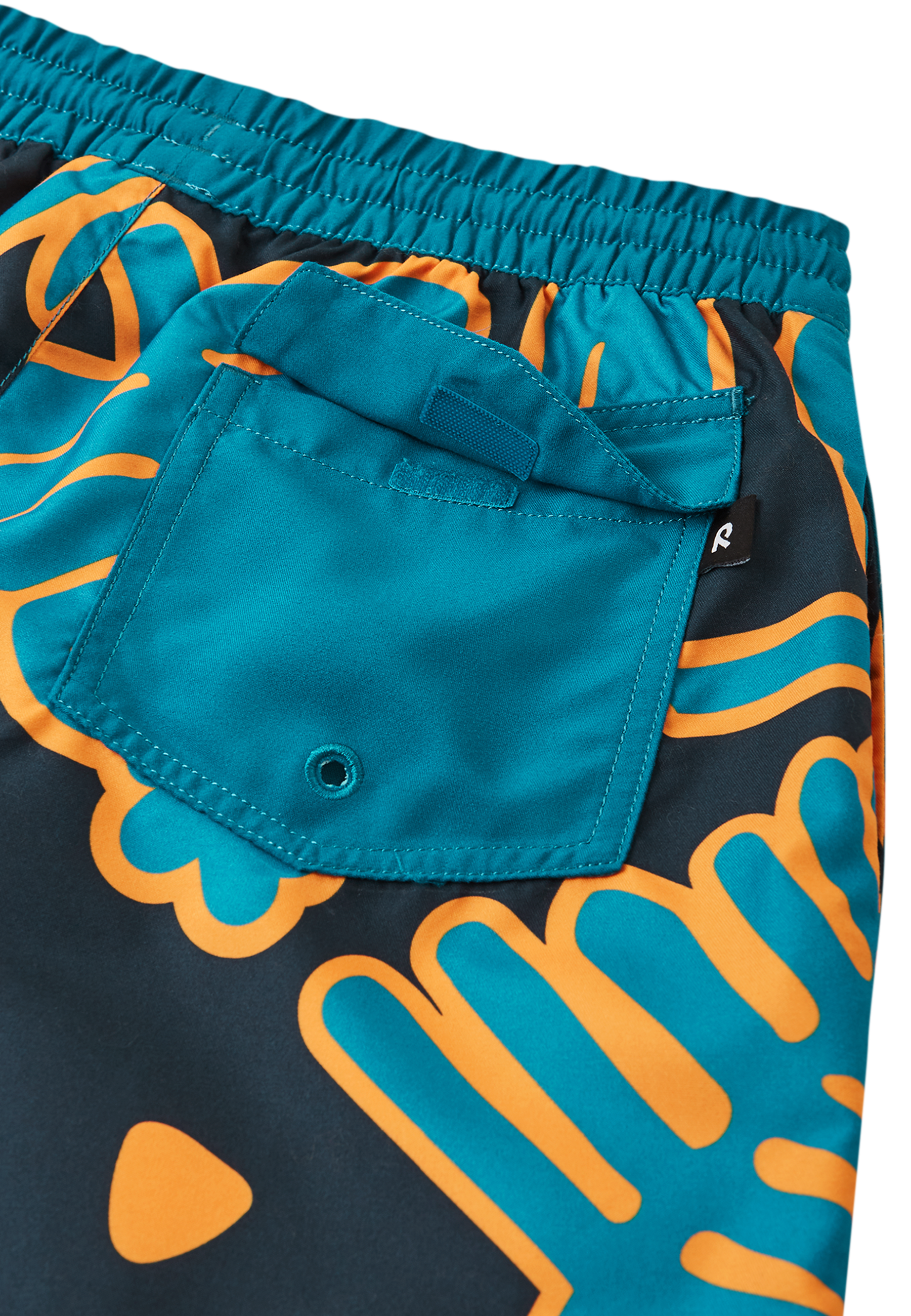 Reima Papaja UV-Badeshorts Blau – Seitenansicht mit Allover-Muster und Tasche
