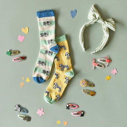 Rockahula Haarspangen mit Löwen- und Gepard-Motiven, präsentiert neben anderen tierischen Designs