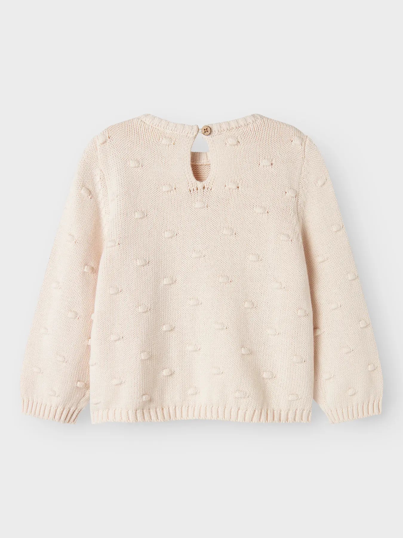 Rückseite des naturfarbenen LIL'ATELIER Strickpullovers aus Bio-Baumwolle, flachliegend fotografiert – Bärechind, Winterthur, Zürich Schweiz.