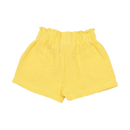 Gelbe Kinder Shorts aus Musselin Bio Baumwolle mit elastischem Bund – erhältlich im Kinderladen Bärechind Winterthur.