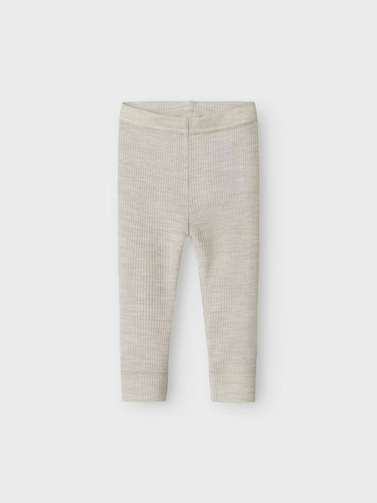 Graue Wollleggings aus Merinowolle mit Rippstruktur, flachliegend fotografiert