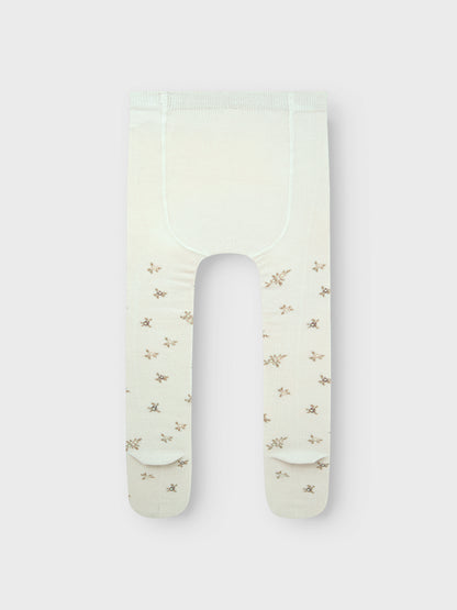 Detailansicht Stoff und Bund weisse Wollstrumpfhose mit Blumenmuster, Bärechind, Winterthur, Zürich Schweiz