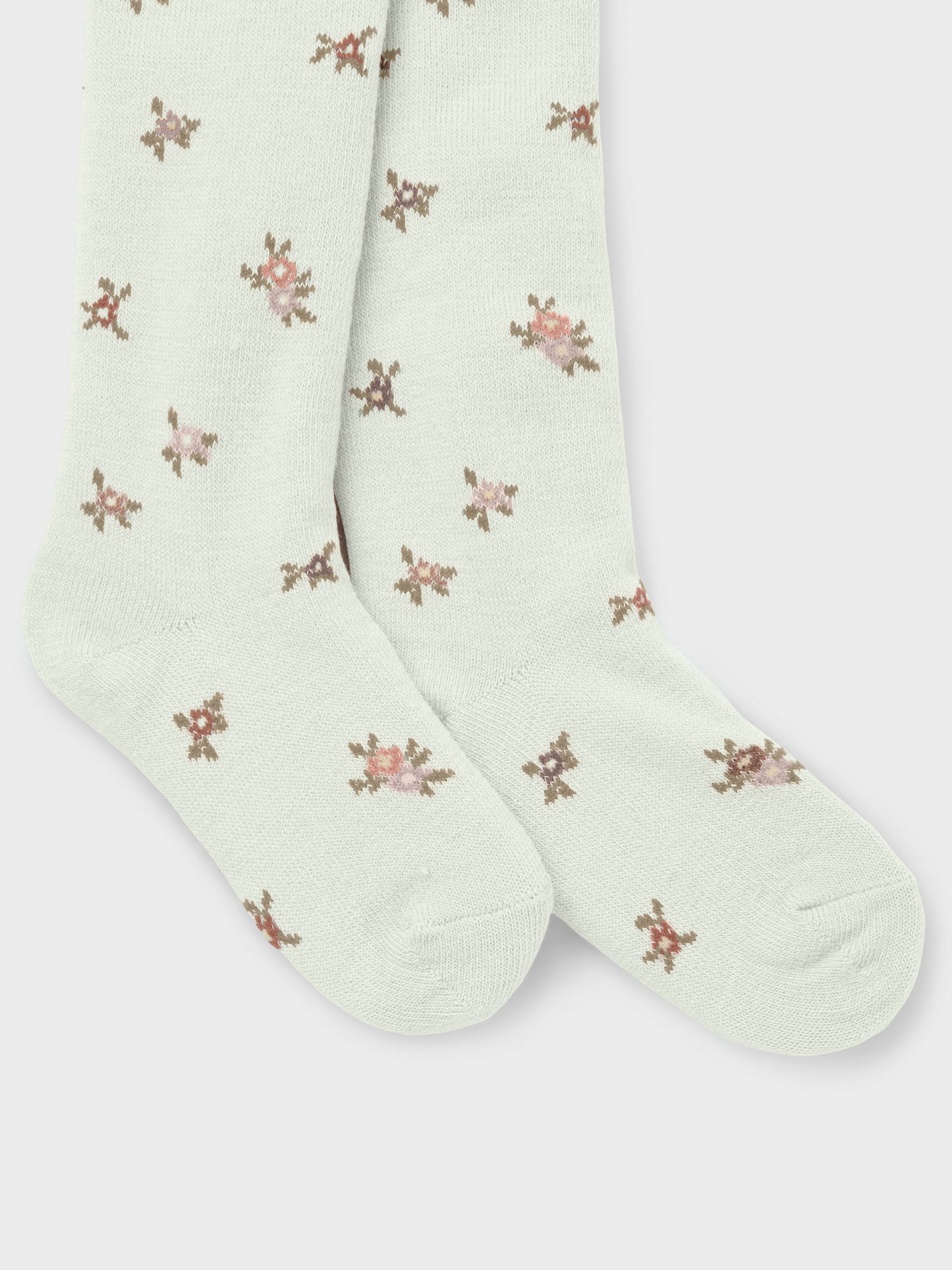 Vorderansicht weisse Wollstrumpfhose mit Blumenmuster für Kinder, Bärechind, Winterthur, Zürich Schweiz