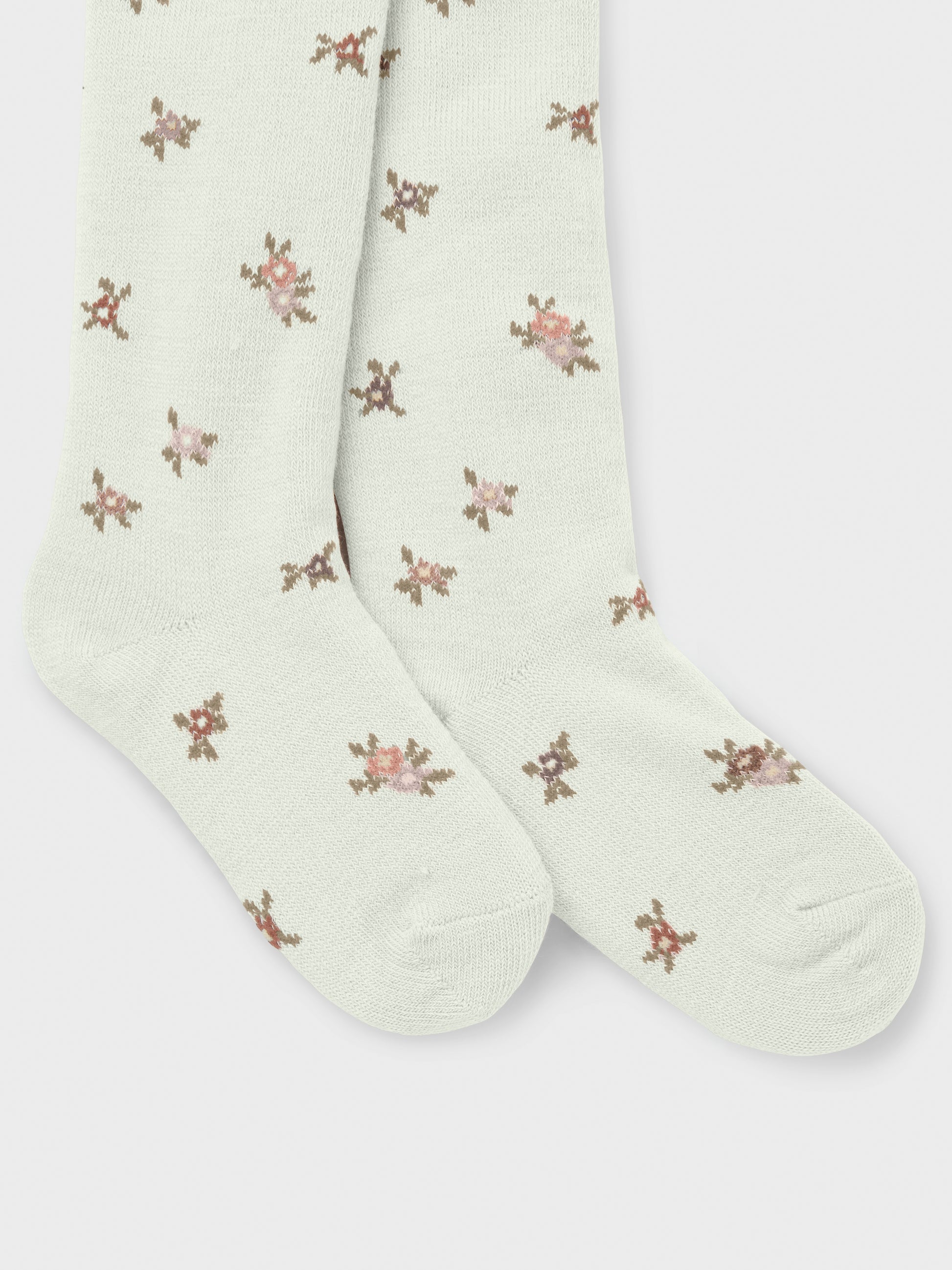 Vorderansicht weisse Wollstrumpfhose mit Blumenmuster für Kinder, Bärechind, Winterthur, Zürich Schweiz