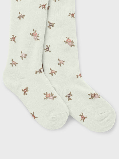 Vorderansicht weisse Wollstrumpfhose mit Blumenmuster für Kinder, Bärechind, Winterthur, Zürich Schweiz